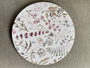 Plato base con funda antiderrames Pradera